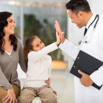 doctor high fiving a kid